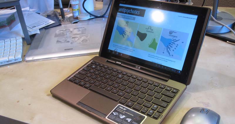 ASUS EEE Pad Transformer in its keyboard dock helps me type out notes faster